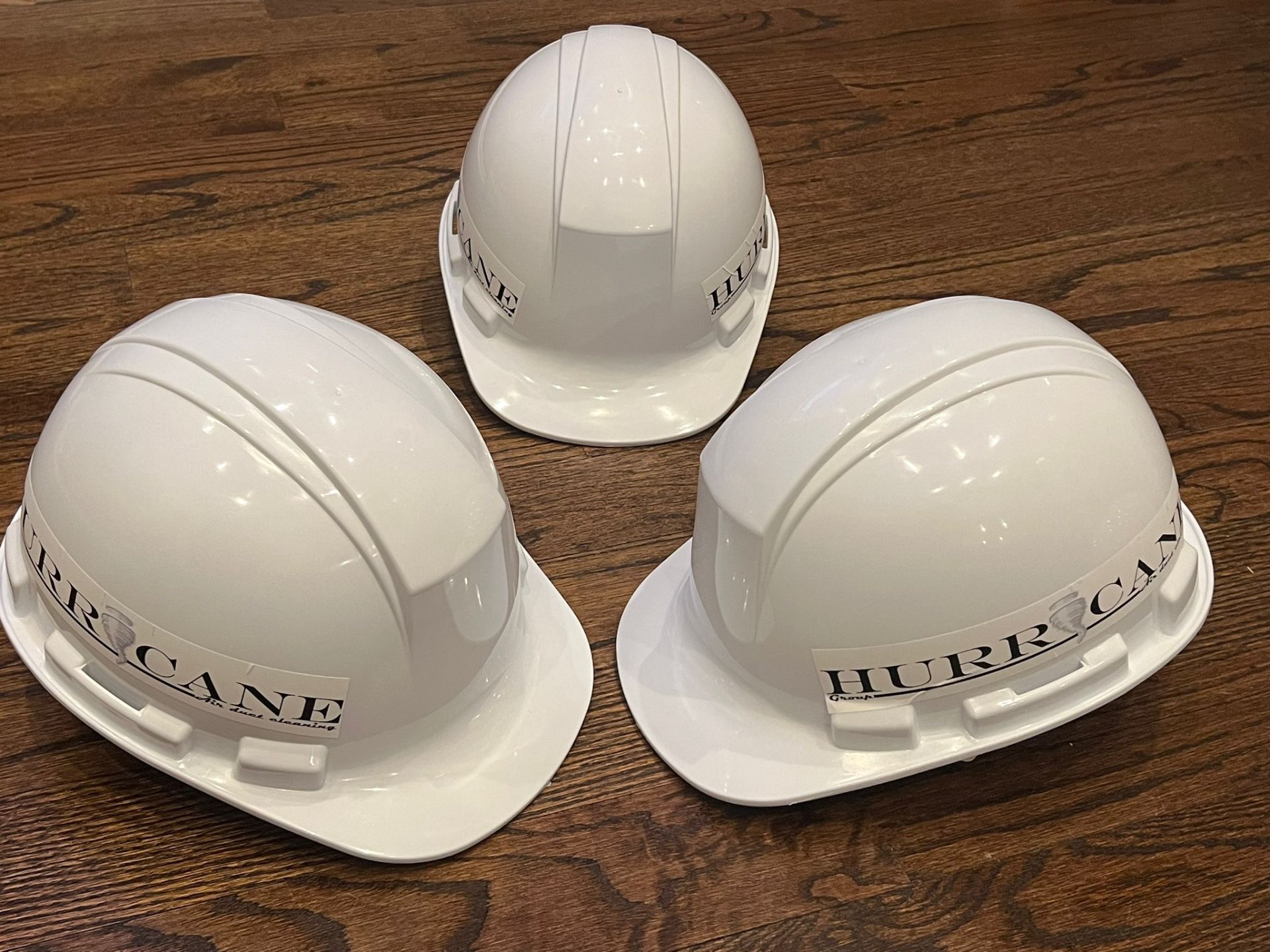 Hurricane Group — branded hard hats ready for restaurant HVAC service