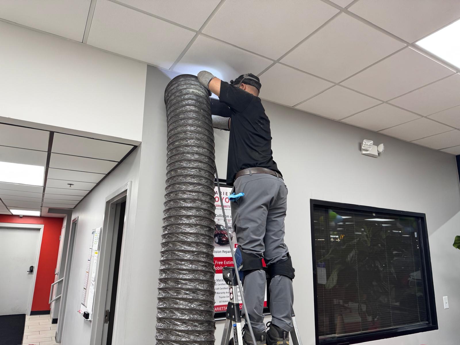 Marietta Toyota office — wall-cap supply duct cleaning above signage