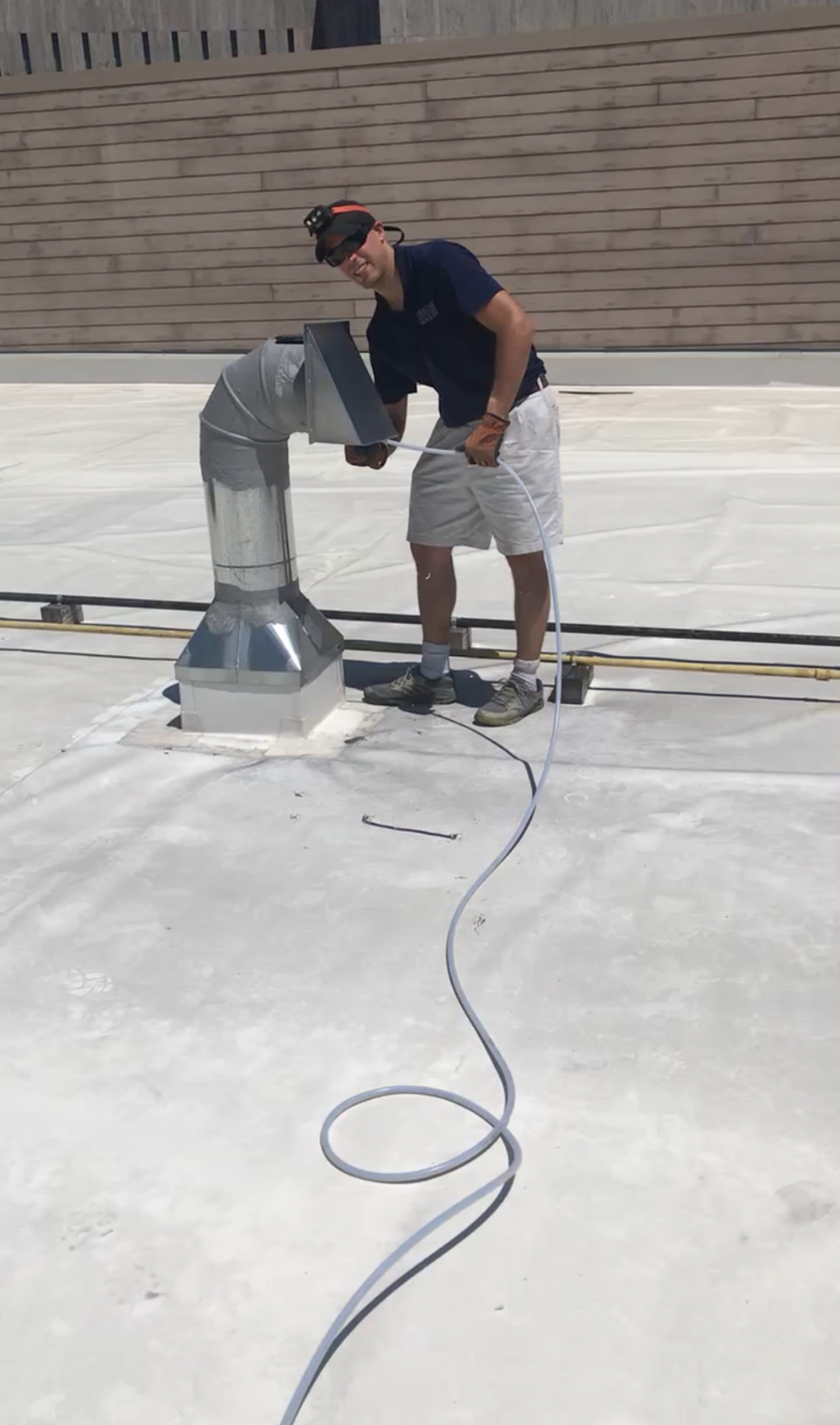 Commercial dryer vent — rooftop exhaust stack cleaning
