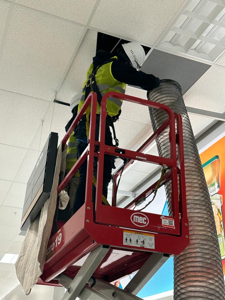 Target — in-ceiling duct access via aerial lift