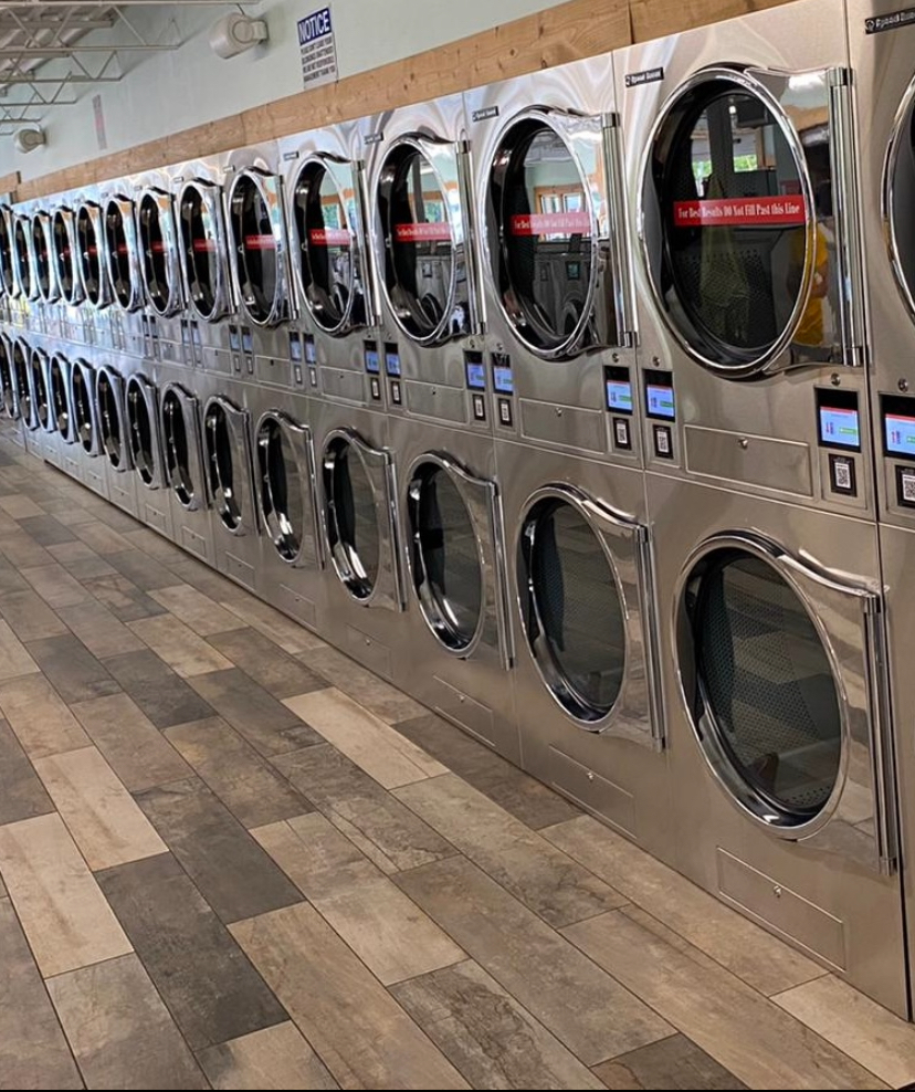 Commercial laundromat — stacked dryer line vent cleaning