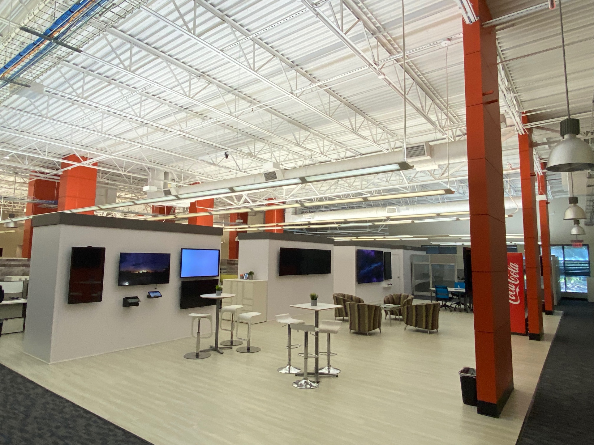 Corporate office atrium — open-ceiling HVAC service