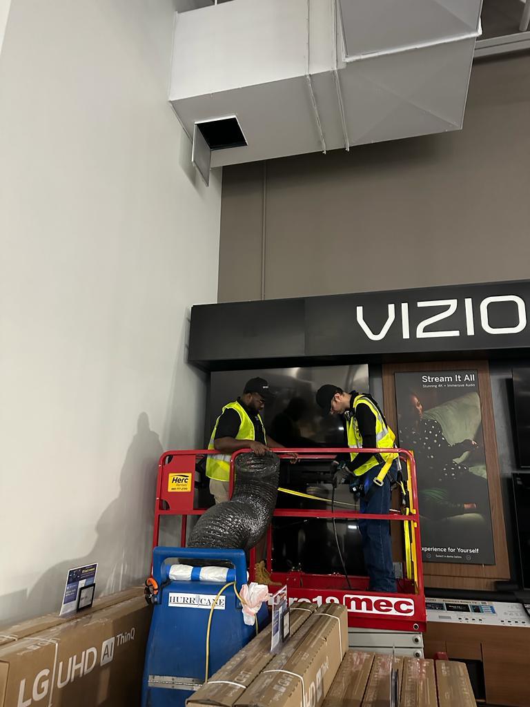 Big-box electronics showroom — Vizio display wall duct service