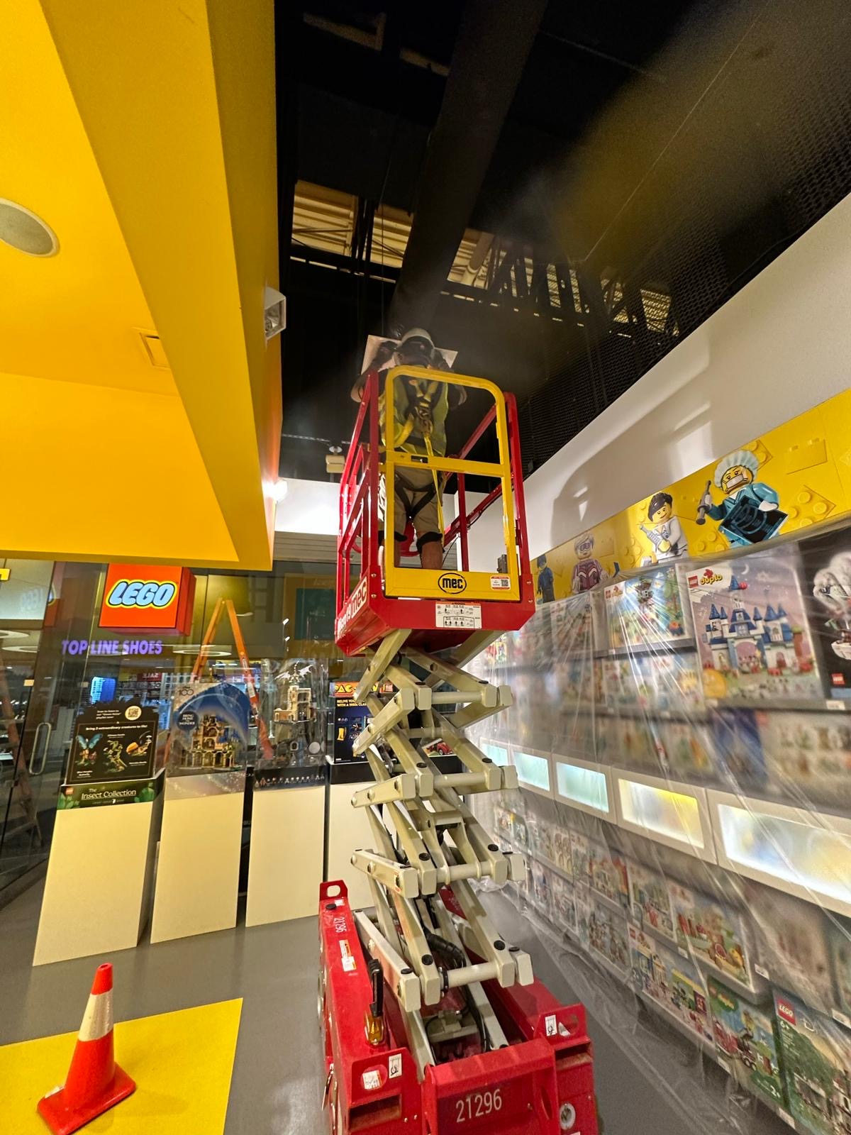 LEGO Store — overhead duct access above retail aisle
