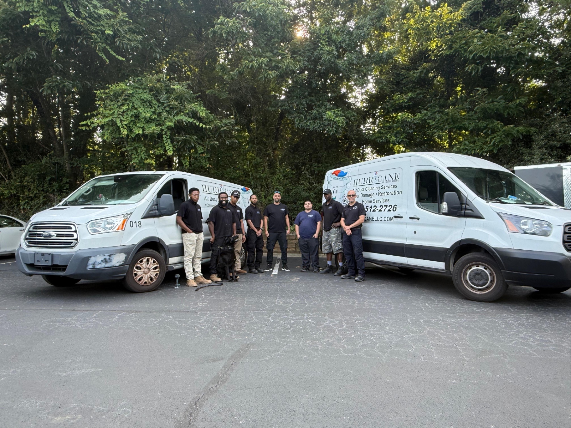 Commercial Air Care crew and service vans before a commercial duct cleaning job