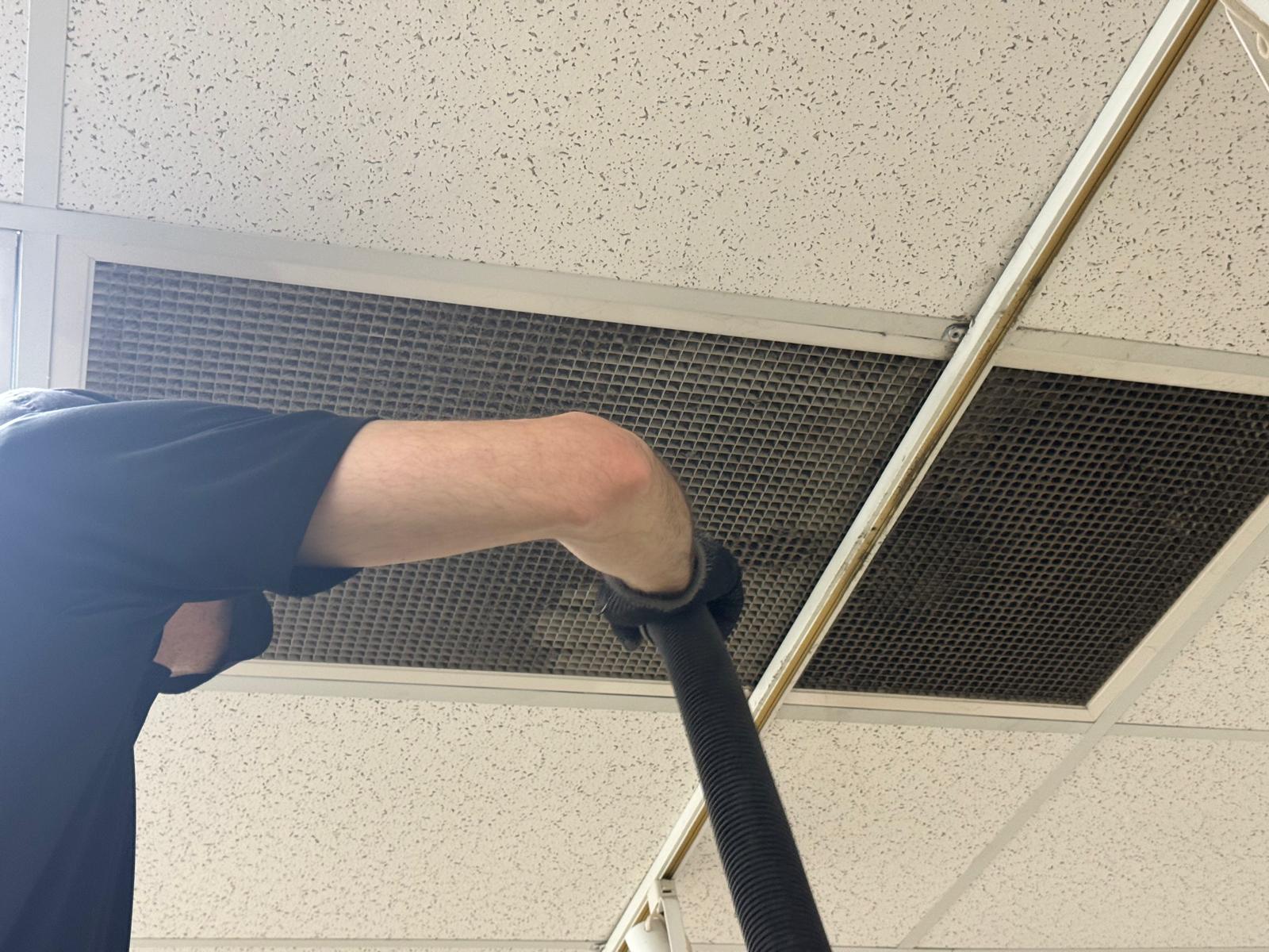 Return-air grille — HEPA vacuum cleaning of ceiling-mounted filter media