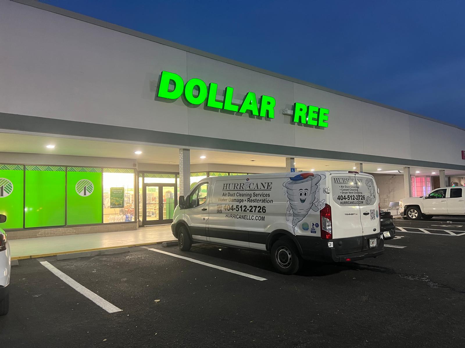 Dollar Tree storefront — Hurricane Group van on-site after-hours for emergency water extraction and water damage restoration