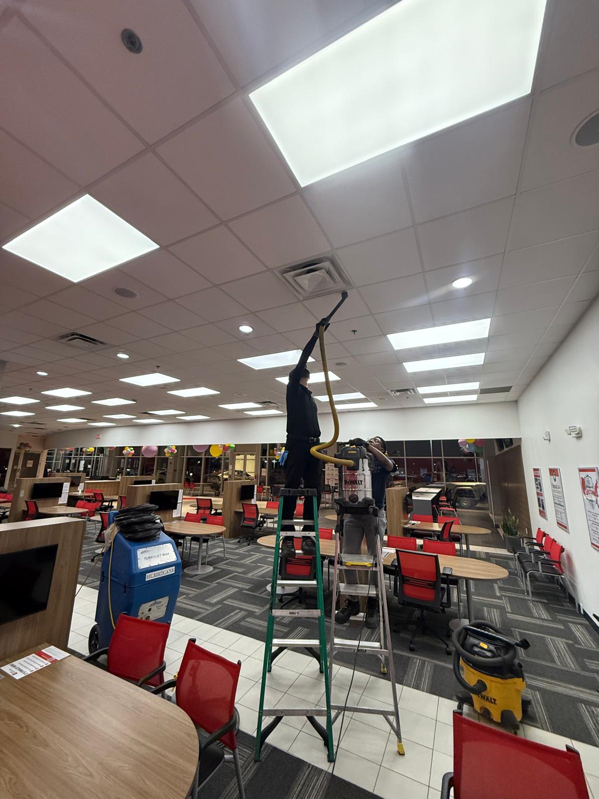 Toyota dealership café — ceiling diffuser cleaning above customer seating