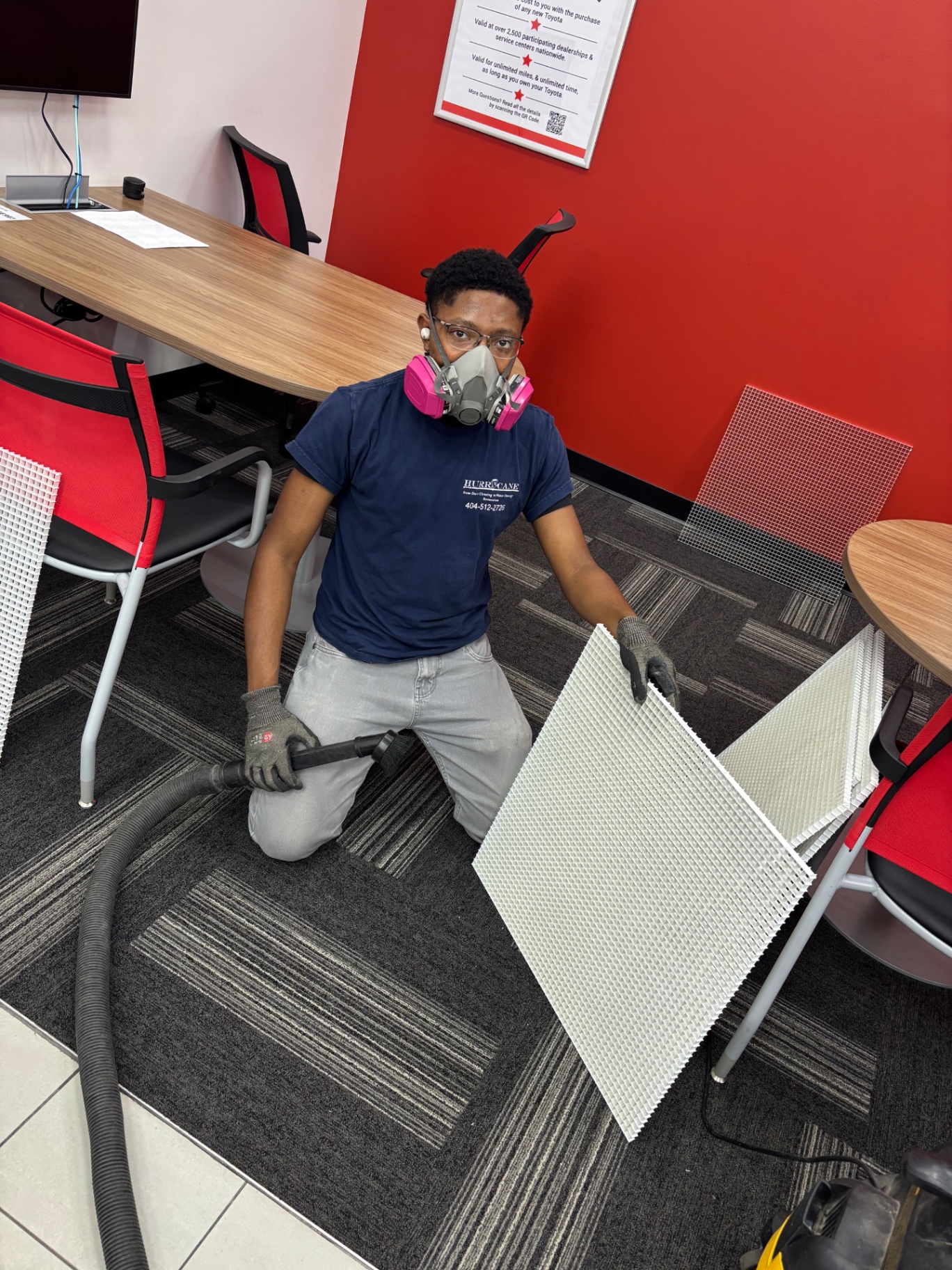 Dealership office — return-air grille cleaning with HEPA vacuum and respirator