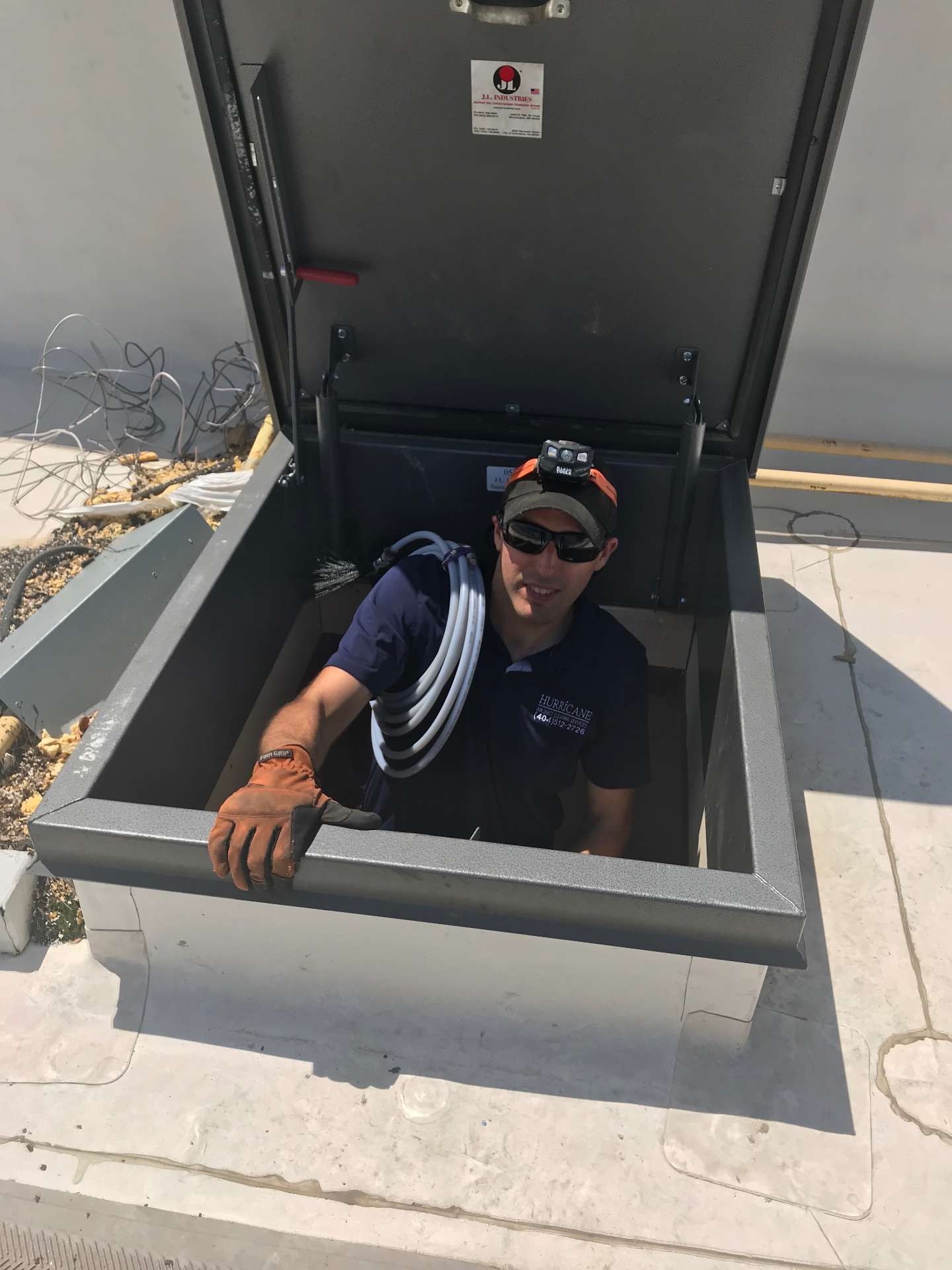 Commercial dryer vent — rooftop access hatch service